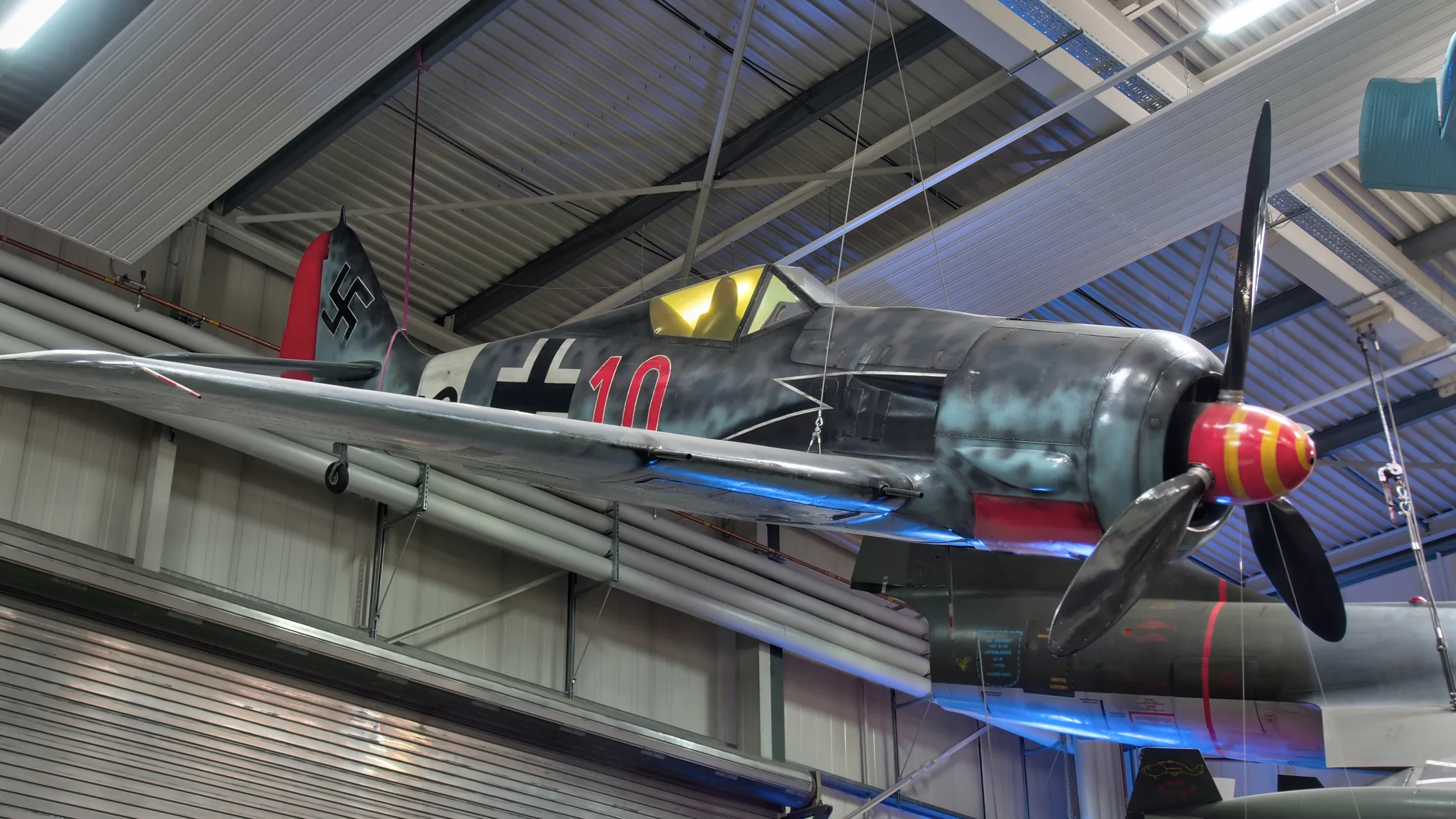 Family-level photograph of a Focke-Wulf Fw 190 preserved at the Auto & Technik Museum Sinsheim; specific subtype is not identified.